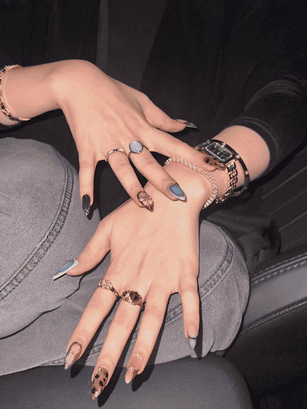 Luxury blue and brown GelX extension nail art design by Riri Nails in Muscat Oman