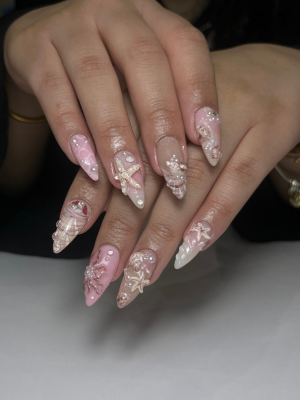 Riri Nails Oman gelx extension service featuring starfish design of pink ocean theme at muscat oman